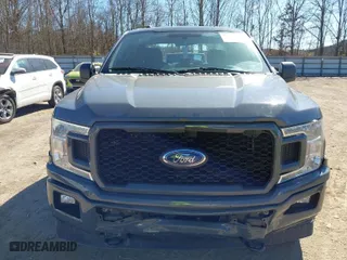 2018 Ford F-150 XL with VIN 1FTEX1EP7JFB50666, listed as a IAAI auction lot 41693673 with 149,570 mi miles. Bid and sale history available at carsss.com. Image 6.