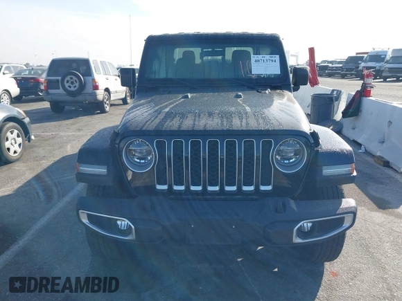 2020 Jeep Gladiator Overland with VIN 1C6HJTFG7LL139980, listed as a IAAI auction lot 40713794 with 33,560 mi miles and . Bid and sale history available at DreamBid. Image 13.
