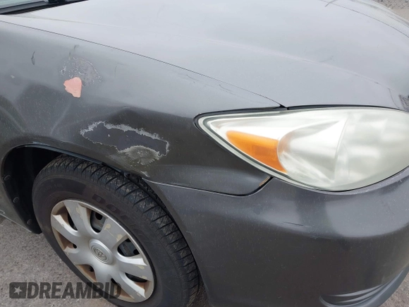 2004 Toyota Camry LE with VIN 4T1BE32K44U915003, listed as a IAAI auction lot 41794140 with 190,217 mi miles and . Bid and sale history available at DreamBid. Image 6.