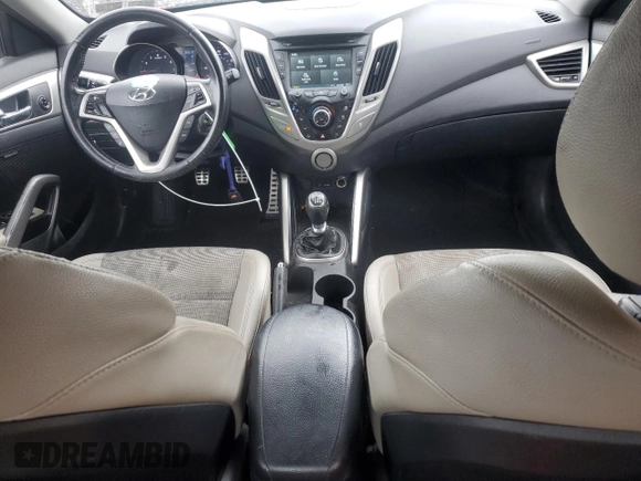 2013 Hyundai Veloster w/Gray Int z VIN KMHTC6AD0DU147454, wystawiony jako Copart lot #57814285 z przebiegiem 91 000 mil mil oraz Szkoda całkowita • Salvage title. Historia ofert i sprzedaży dostępna na DreamBid. Obrazek 8.
