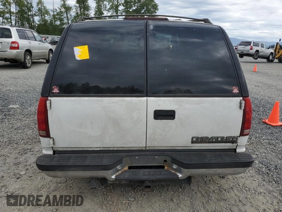 1999 Chevrolet Tahoe Z71 with VIN 1GNEK13R1XJ365475, listed as a Copart auction lot 56258175 with 184,647 mi miles and Clean Title. Bid and sale history available at DreamBid. Image 6.