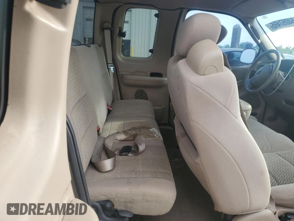2003 Ford F-150 XL with VIN 1FTRX17LX3NA38576, listed as a Copart auction lot 54057495 with 173,811 mi miles and Salvage title. Bid and sale history available at DreamBid. Image 10.