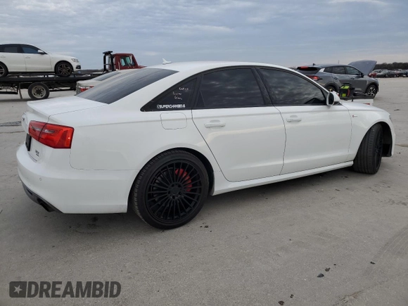 2015 Audi A6 3.0T Prestige with VIN WAUHGAFCXFN031884, listed as a Copart auction lot 41890843 with 136,077 mi miles. Bid and sale history available at carsss.com. Image 3.