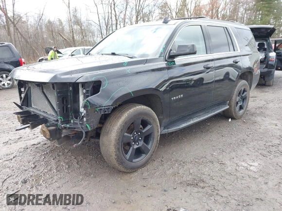2018 Chevrolet Tahoe LT z VIN 1GNSKBKC7JR276427, wystawiony jako IAAI lot #41977418 z przebiegiem 152 007 mil mil oraz . Historia ofert i sprzedaży dostępna na DreamBid. Obrazek 2.