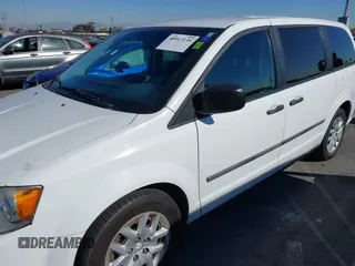 2014 Ram Cargo Van Tradesman with VIN 2C4JRGAG7ER182016, listed as a IAAI auction lot 40917239 with 183,562 mi miles. Bid and sale history available at carsss.com. Image 6.