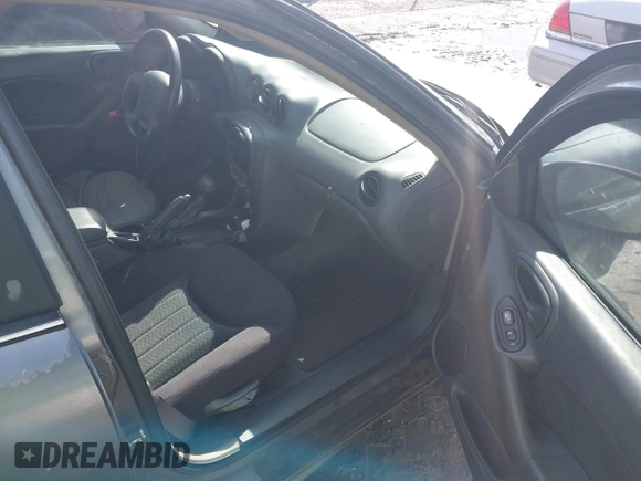 2004 Pontiac Grand Am SE1 z VIN 1G2NF52F04M513755, wystawiony jako IAAI lot #41600613 z przebiegiem Nie podano mil oraz . Historia ofert i sprzedaży dostępna na DreamBid. Obrazek 5.