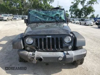 2016 Jeep Wrangler Unlimited Rubicon with VIN 1C4BJWFG7GL320650, listed as a Copart auction lot 53900195 with 77,620 mi miles and Salvage title. Bid and sale history available at DreamBid. Image 5.