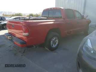 2000 Dodge Dakota Sport with VIN 1B7GL2AZ4YS722151, listed as a Copart auction lot 87870705 with 169,435 mi miles and Salvage Title. Bid and sale history available at DreamBid. Image 3.