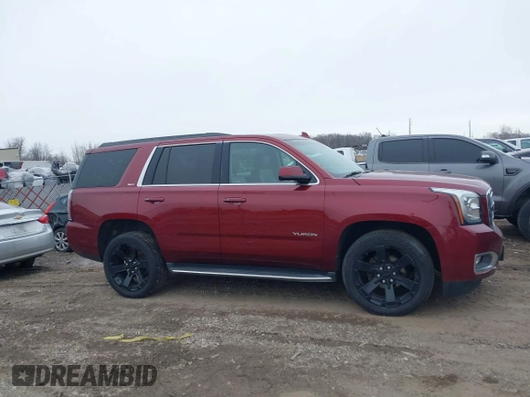2016 GMC Yukon SLT with VIN 1GKS2BKC0GR339695, listed as a IAAI auction lot 41690832 with 176,119 mi miles and . Bid and sale history available at DreamBid. Image 13.