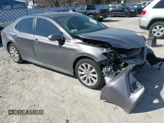 2019 Toyota Camry LE with VIN 4T1B11HK9KU810347, listed as a IAAI auction lot 41804007 with 75,063 mi miles and . Bid and sale history available at DreamBid. Image 1.