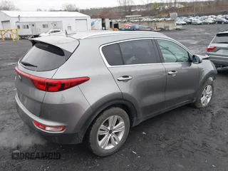 2017 Kia Sportage LX with VIN KNDPMCAC2H7238741, listed as a IAAI auction lot 41973333 with 64,714 mi miles and . Bid and sale history available at carsss.com. Image 4.