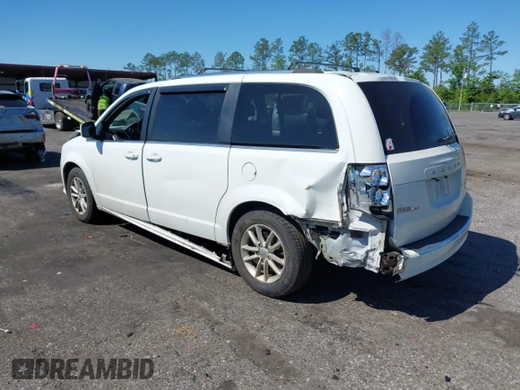 2018 Dodge Grand Caravan SXT with VIN 2C4RDGCG1JR326457, listed as a IAAI auction lot 42047301 with 84,518 mi miles and . Bid and sale history available at DreamBid. Image 3.