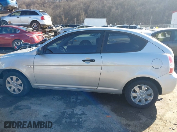 2007 Hyundai Accent GS with VIN KMHCM36C97U043769, listed as a IAAI auction lot 41526011 with 230,566 mi miles. Bid and sale history available at carsss.com. Image 14.
