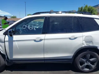 2019 Honda Passport Elite z VIN 5FNYF8H05KB009575, wystawiony jako IAAI lot #42804678 z przebiegiem 70 468 mil mil oraz . Historia ofert i sprzedaży dostępna na DreamBid. Obrazek 15.