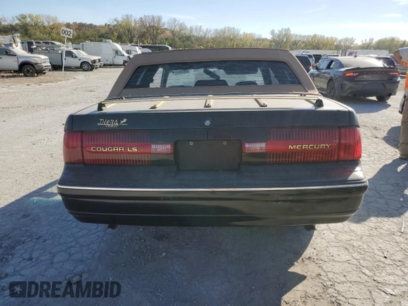 1991 Mercury Cougar z VIN 1MEPM60T2MH600363, wystawiony jako Copart lot #76543714 z przebiegiem 169 767 mil mil oraz Szkoda całkowita • Salvage title. Historia ofert i sprzedaży dostępna na DreamBid. Obrazek 6.