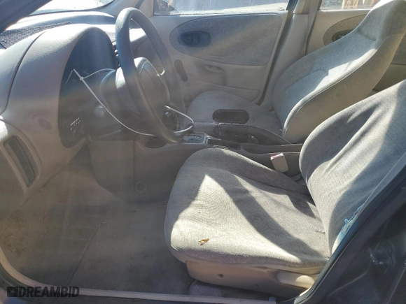 1997 Saturn SL with VIN 1G8ZH5281VZ133993, listed as a Copart auction lot 87155774 with 135,932 mi miles and Salvage Title. Bid and sale history available at carsss.com. Image 7.