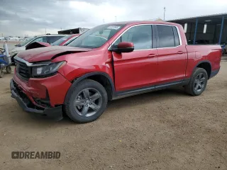 2023 Honda Ridgeline RTL with VIN 5FPYK3F52PB036809, listed as a Copart auction lot 57237855 with 40,730 mi miles and Salvage title. Bid and sale history available at DreamBid. Image 1.