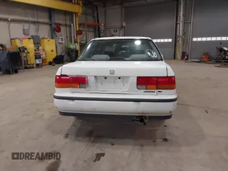 1993 Honda Accord z VIN 1HGCB7651PA022436, wystawiony jako IAAI lot #41785092 z przebiegiem Nie podano mil oraz . Historia ofert i sprzedaży dostępna na DreamBid. Obrazek 16.