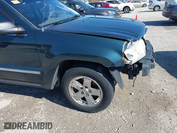 2006 Jeep Grand Cherokee Limited with VIN 1J4HR58NX6C114451, listed as a IAAI auction lot 42093832 with 264,418 mi miles. Bid and sale history available at carsss.com. Image 19.