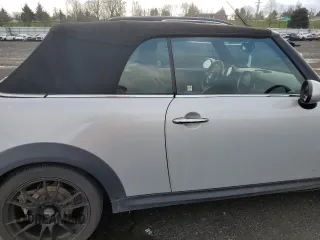 2013 MINI Convertible S with VIN WMWZP3C55DT297215, listed as a Copart auction lot 87995095 with Not provided miles and Salvage title. Bid and sale history available at DreamBid. Image 10.