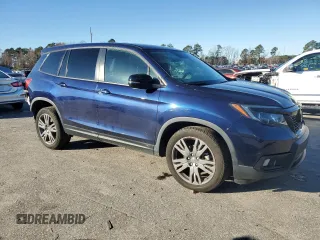 2019 Honda Passport EX-L with VIN 5FNYF7H55KB011252, listed as a Copart auction lot 82930234 with 61,777 mi miles and Salvage Title. Bid and sale history available at carsss.com. Image 4.