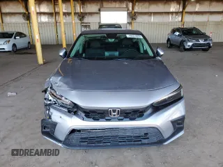 2023 Honda Civic EX-L z VIN 19XFL1H77PE004072, wystawiony jako Copart lot #49524855 z przebiegiem 21 100 mil mil oraz Szkoda całkowita • Salvage title. Historia ofert i sprzedaży dostępna na DreamBid. Obrazek 5.