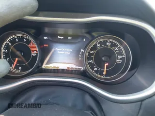 2017 Jeep Cherokee Overland z VIN 1C4PJMJS2HW599477, wystawiony jako IAAI lot #41335748 z przebiegiem 165 330 mil mil oraz . Historia ofert i sprzedaży dostępna na DreamBid. Obrazek 7.