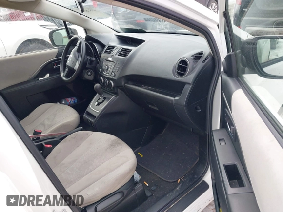 2012 Mazda 5 Sport z VIN JM1CW2BL6C0124440, wystawiony jako IAAI lot #41378536 z przebiegiem 157 262 mil mil oraz . Historia ofert i sprzedaży dostępna na DreamBid. Obrazek 5.