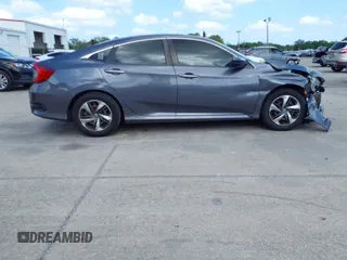 2020 Honda Civic LX with VIN 2HGFC2F65LH575320, listed as a IAAI auction lot 42009564 with Not Provided miles and . Bid and sale history available at DreamBid. Image 13.