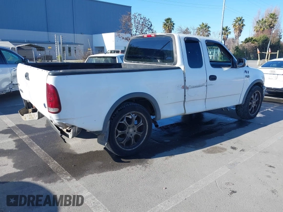 1997 Ford F-150 with VIN 1FTDX1723VKB04987, listed as a IAAI auction lot 41411405 with 234,750 mi miles and . Bid and sale history available at DreamBid. Image 4.