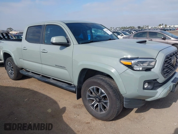 2022 Toyota Tacoma SR5 z VIN 3TMBZ5DN3NM034388, wystawiony jako IAAI lot #42270543 z przebiegiem 179 904 mil mil oraz . Historia ofert i sprzedaży dostępna na DreamBid. Obrazek 1.