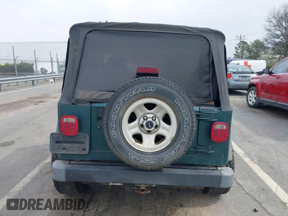2000 Jeep Wrangler SE with VIN 1J4FA29P0YP728370, listed as a IAAI auction lot 41788463 with 186,995 mi miles. Bid and sale history available at carsss.com. Image 16.