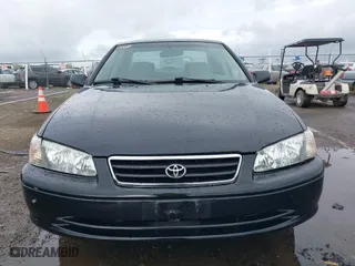 2000 Toyota Camry CE with VIN JT2BG22KXY0432288, listed as a IAAI auction lot 41927856 with 203,035 mi miles. Bid and sale history available at carsss.com. Image 6.
