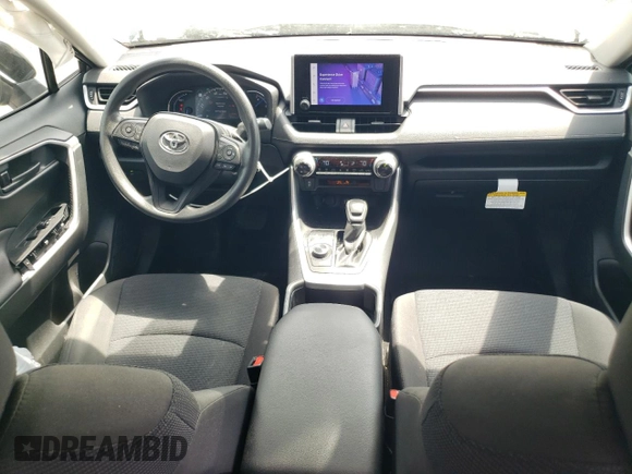 2023 Toyota RAV4 Hybrid LE with VIN JTMLWRFV8PD200078, listed as a Copart auction lot 57490185 with 67,321 mi miles and Salvage title. Bid and sale history available at DreamBid. Image 8.
