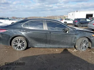 2018 Toyota Camry LE z VIN 4T1B11HK5JU649736, wystawiony jako IAAI lot #41536240 z przebiegiem 20 330 mil mil oraz . Historia ofert i sprzedaży dostępna na DreamBid. Obrazek 12.