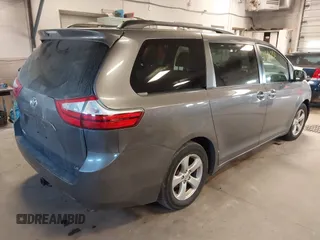 2015 Toyota Sienna LE AAS with VIN 5TDKK3DC6FS652281, listed as a IAAI auction lot 41891750 with 150,162 mi miles. Bid and sale history available at carsss.com. Image 4.