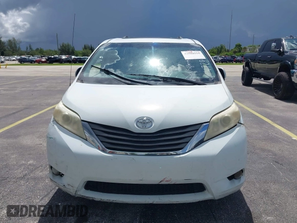 2014 Toyota Sienna XLE with VIN 5TDYK3DC4ES414728, listed as a IAAI auction lot 42588916 with 291,007 mi miles and . Bid and sale history available at DreamBid. Image 12.