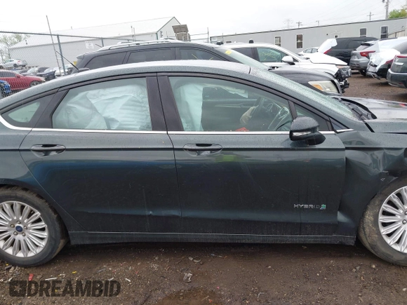 2015 Ford Fusion SE Hybrid with VIN 3FA6P0LU9FR184907, listed as a IAAI auction lot 42119737 with 153,255 mi miles and . Bid and sale history available at DreamBid. Image 14.