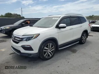 2018 Honda Pilot Touring z VIN 5FNYF6H90JB024311, wystawiony jako Copart lot #54473735 z przebiegiem 46 662 mil mil oraz Szkoda całkowita • Salvage title. Historia ofert i sprzedaży dostępna na DreamBid. Obrazek 1.