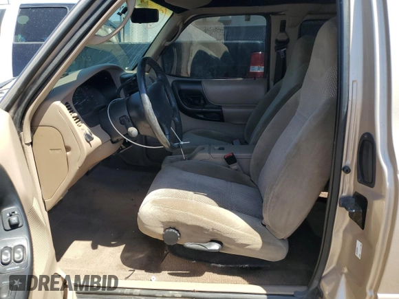 1998 Ford Ranger XL with VIN 1FTZR15X2WPB03820, listed as a Copart auction lot 60717595 with 202,801 mi miles and Salvage title. Bid and sale history available at DreamBid. Image 7.
