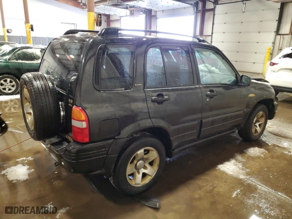 2000 Suzuki Grand Vitara JLX with VIN JS3TD62V1Y4113961, listed as a Copart auction lot 41488995 with 212,541 mi miles and Salvage Title. Bid and sale history available at carsss.com. Image 3.
