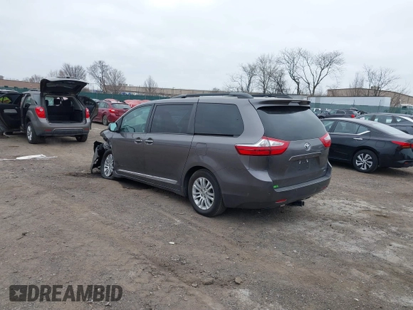 2016 Toyota Sienna XLE with VIN 5TDYK3DCXGS737846, listed as a IAAI auction lot 41782055 with 126,846 mi miles. Bid and sale history available at carsss.com. Image 3.
