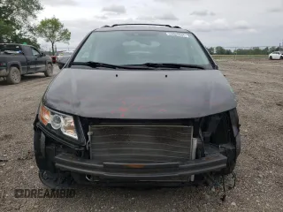 2014 Honda Odyssey Touring with VIN 5FNRL5H90EB014360, listed as a Copart auction lot 56699845 with 180,913 mi miles and Salvage title. Bid and sale history available at DreamBid. Image 5.
