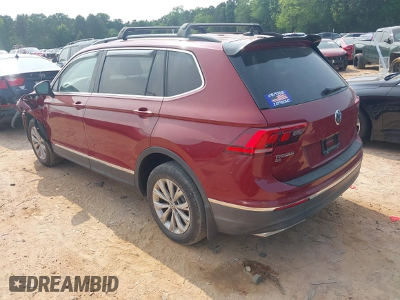 2018 Volkswagen Tiguan SEL with VIN 3VV3B7AX9JM054814, listed as a IAAI auction lot 42394400 with 92,160 mi miles and . Bid and sale history available at DreamBid. Image 3.