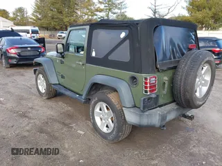 2016 Jeep Wrangler Sport with VIN 1C4AJWAG7GL330159, listed as a IAAI auction lot 41530415 with 98,554 mi miles and . Bid and sale history available at carsss.com. Image 3.