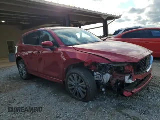 2023 Mazda CX-5 Signature with VIN JM3KFBXY4P0100652, listed as a Copart auction lot 82235664 with 29,344 mi miles and Salvage Title. Bid and sale history available at carsss.com. Image 4.