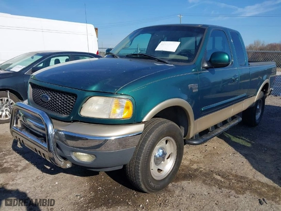 2000 Ford F-150 XL with VIN 1FTRX18L4YNA94311, listed as a IAAI auction lot 41814890 with 1 mi miles. Bid and sale history available at carsss.com. Image 2.