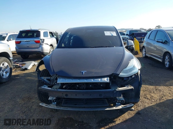 2021 Tesla Model Y Long Range with VIN 5YJYGDEE5MF191142, listed as a IAAI auction lot 41448514 with 71,626 mi miles. Bid and sale history available at carsss.com. Image 13.