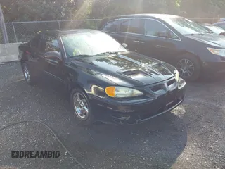 2003 Pontiac Grand Am with VIN 1G2NV12E93C228236, listed as a IAAI auction lot 42649462 with 159,233 mi miles and . Bid and sale history available at DreamBid. Image 1.