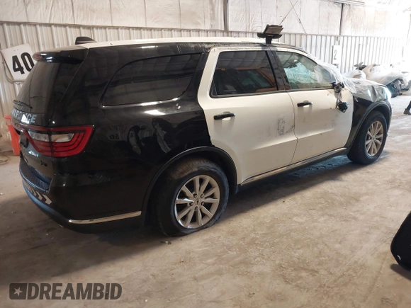 2020 Dodge Durango Pursuit with VIN 1C4SDJFT6LC215079, listed as a IAAI auction lot 40276358 with 96,019 mi miles and . Bid and sale history available at DreamBid. Image 4.